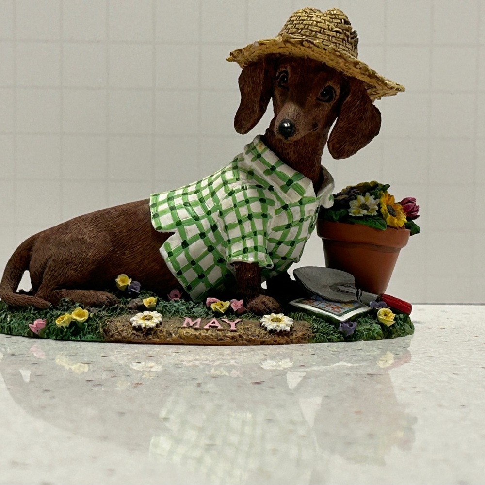 Danbury Mint Dachshund calendar figurine. January, April, and May only